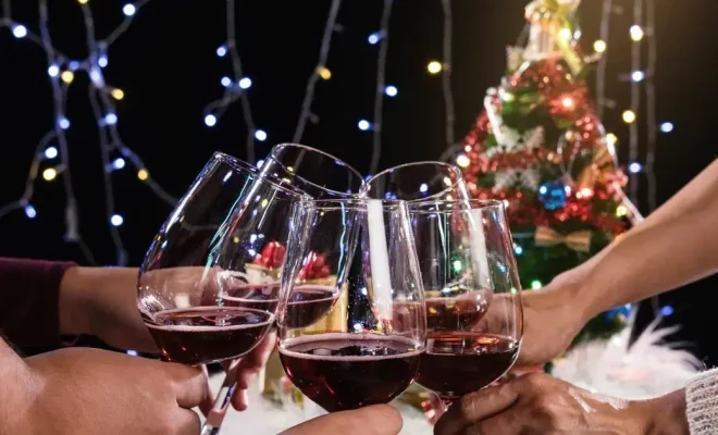 0 midsection of friends toasting wineglasses during christmas.jpg