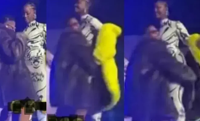 video tems epic reaction after wizkid grabbed her by her backside on stage during his concert.jpg
