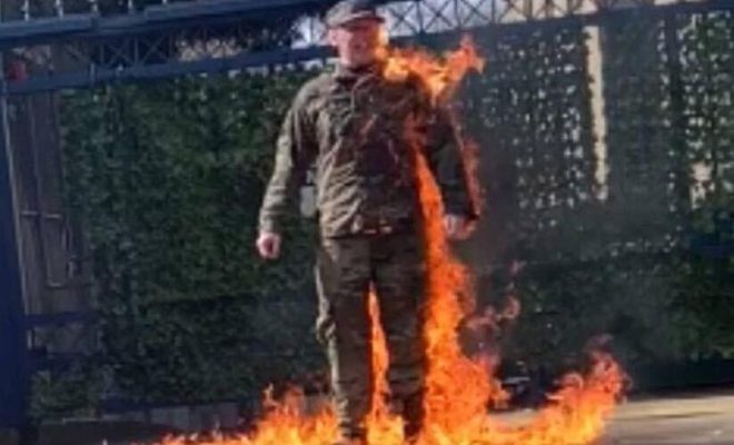 us airman sets self ablaze